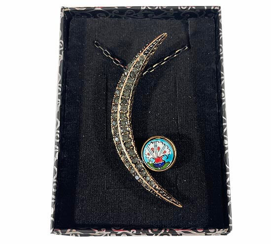 Collier bronze motif œillet sur fond turquoise - 2